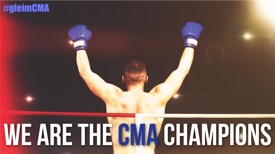 raising hands for being the CMA champions