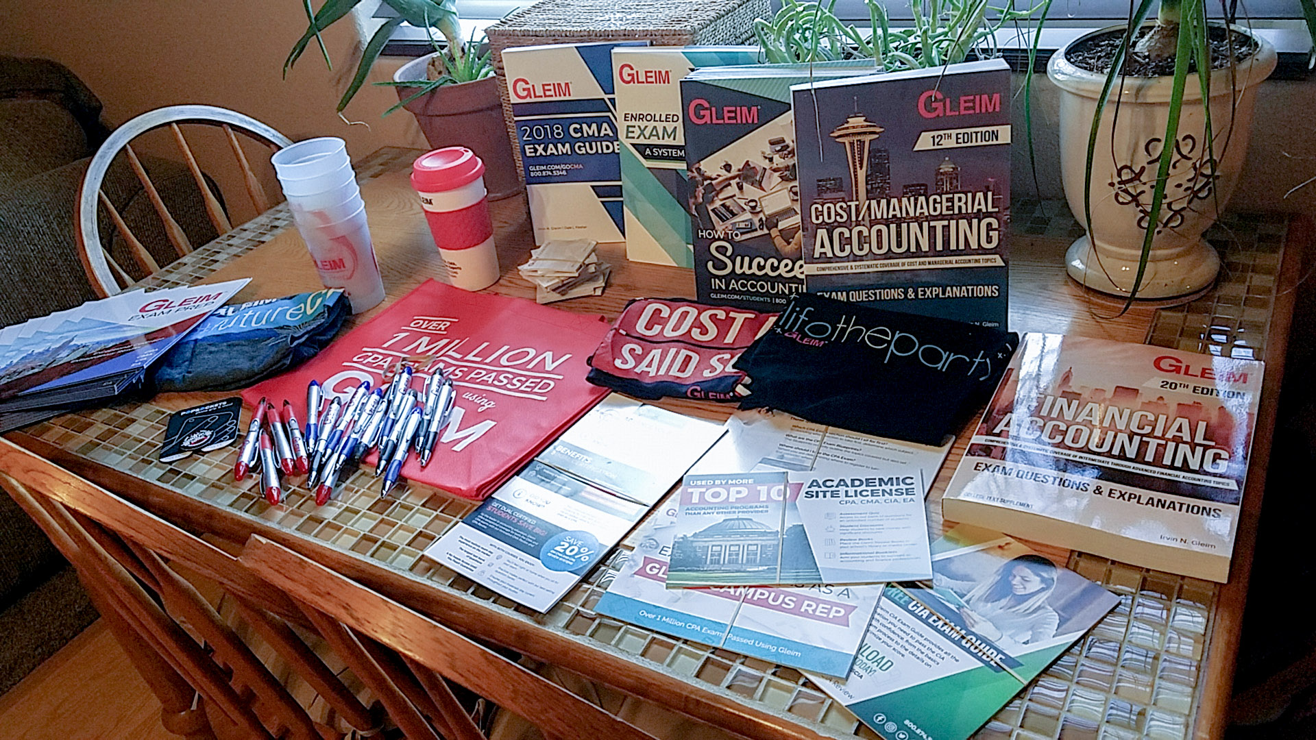 Tabletop filled with Campus Rep materials.